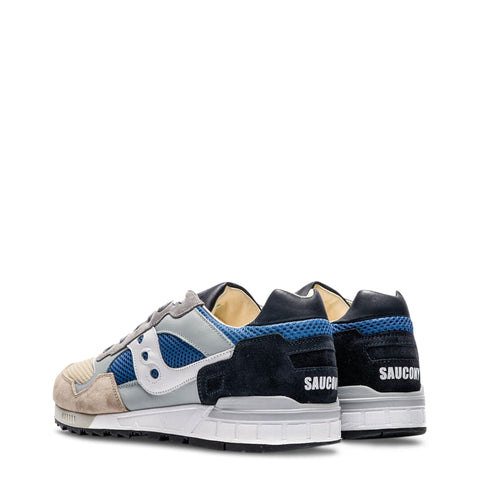 Saucony Shadow-5000 sneakers by Jag Couture London-New York, featuring black and white colorway with classic athletic design.