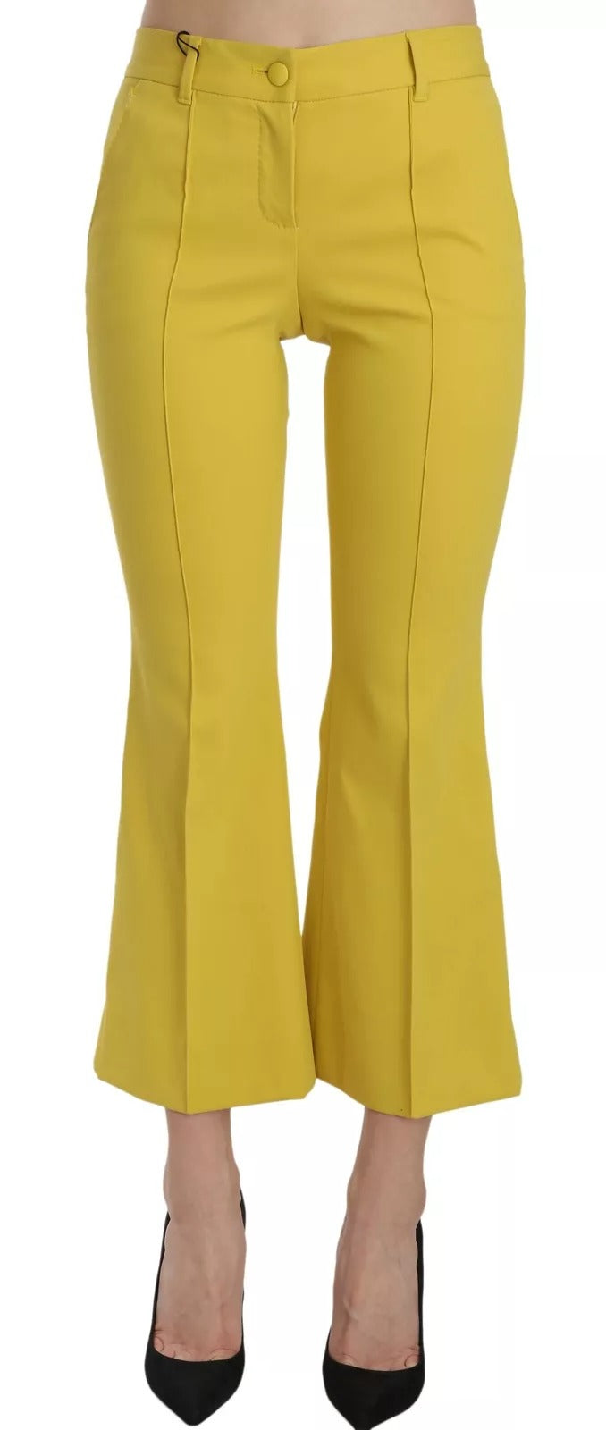 Yellow flared bootcut cotton capri pants by Dolce & Gabbana, showing a close-up of the stylish, fitted waist and flared hem.