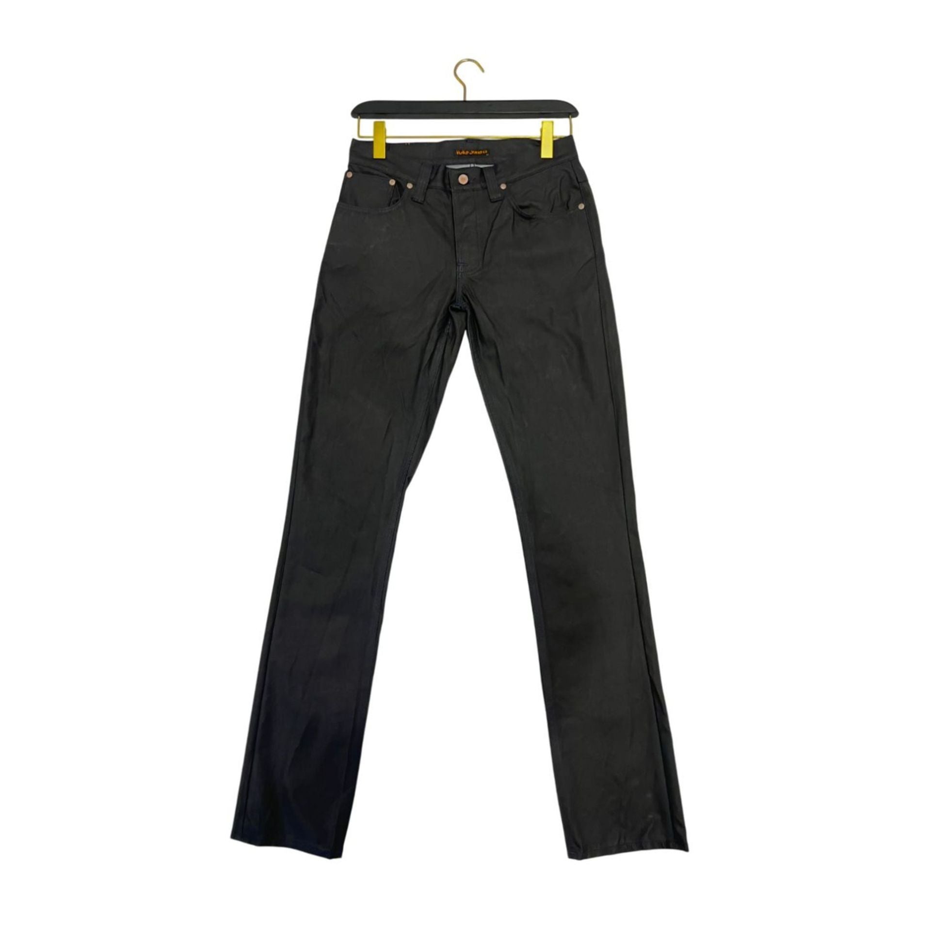 Nudie Jeans NJ3008GRIMTIM_NeroBlack in black denim, slim fit design, displayed with focus on the jeans' fabric and stitching details.