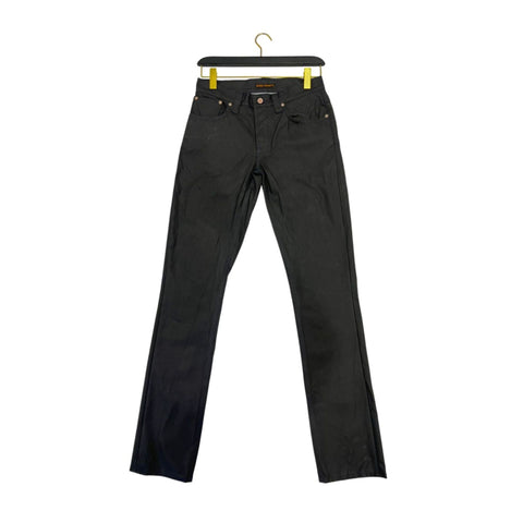 Nudie Jeans NJ3008GRIMTIM_NeroBlack in black denim, slim fit design, displayed with focus on the jeans' fabric and stitching details.