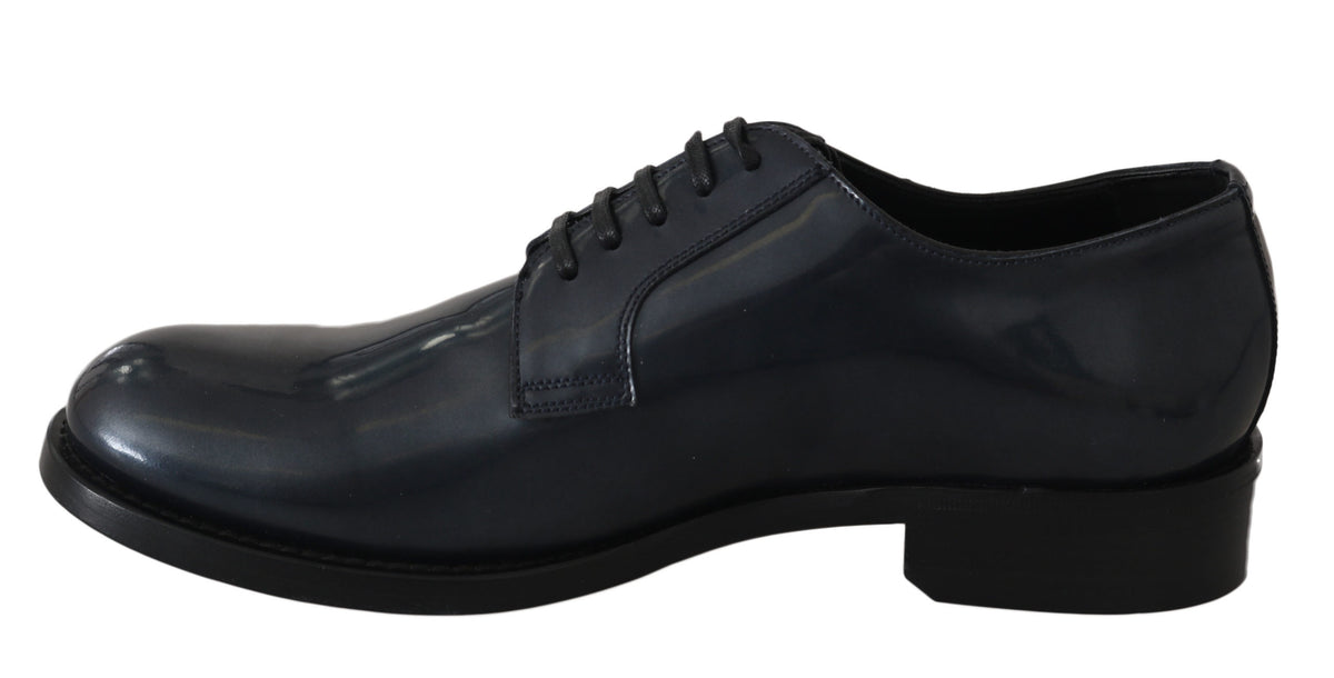 Blue leather Derby dress shoes by Dolce & Gabbana, featuring sleek formal design and polished finish.
