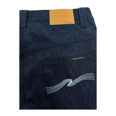Nudie Jeans NJ3277 ThinFinn blue navy slim-fit denim jeans displayed on a mannequin with pockets and stitching details.