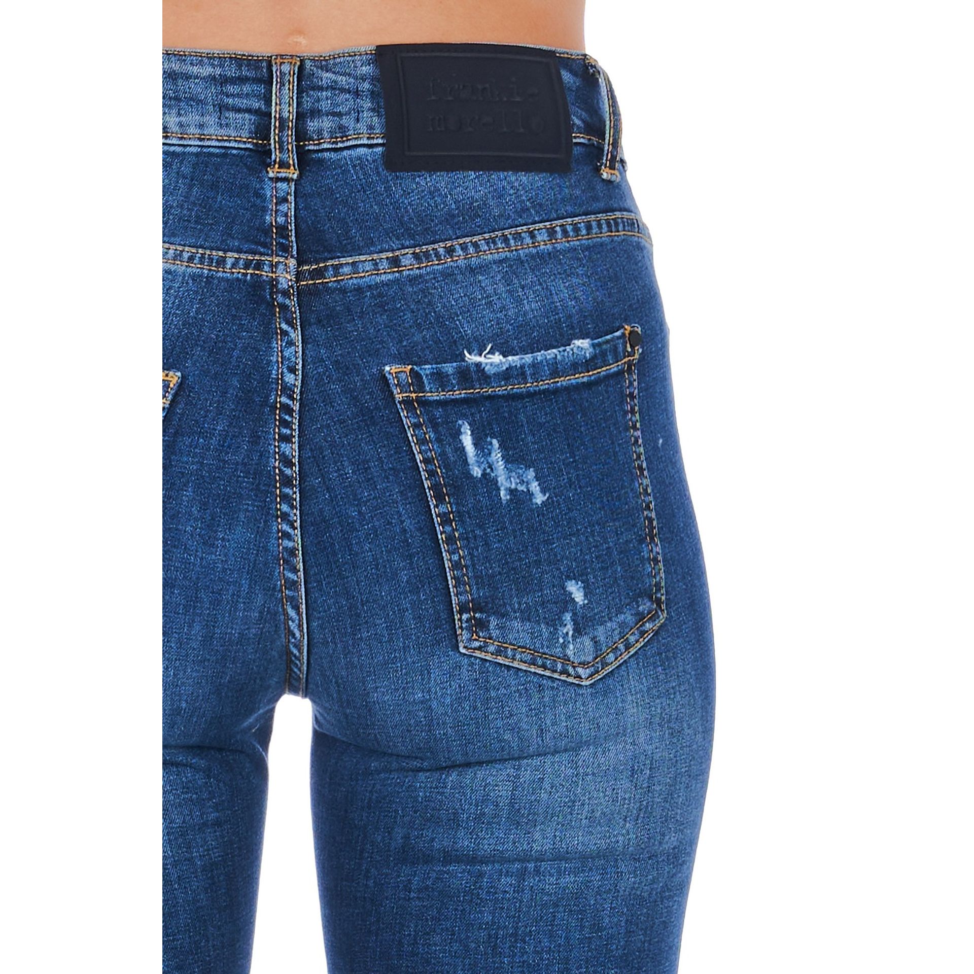 Denim jacket by Frankie Morello FWCS9207JE_B02, featuring classic design and stylish details, displayed on a hanger.