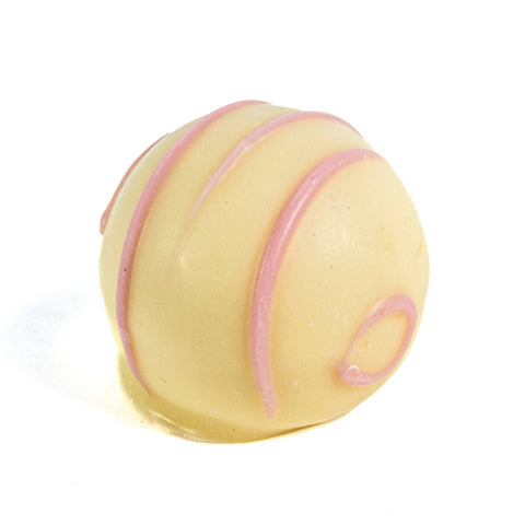 Jag Couture London apple pie white chocolate truffle filled with apple pie ganache, 12.5g, showcasing its creamy filling and elegant appearance.