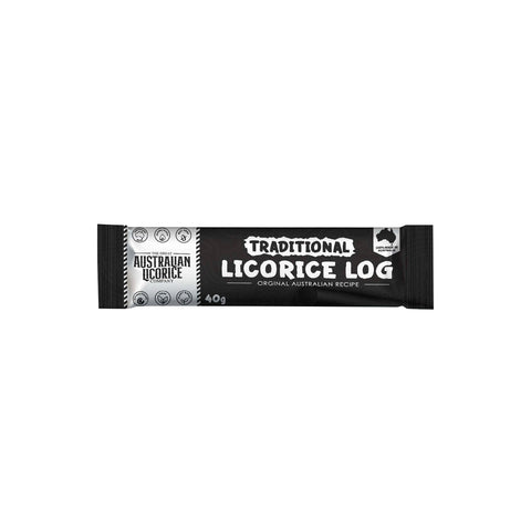 Traditional licorice log from Jag Couture London - New York, showing a close-up of the dark, textured licorice candy log.