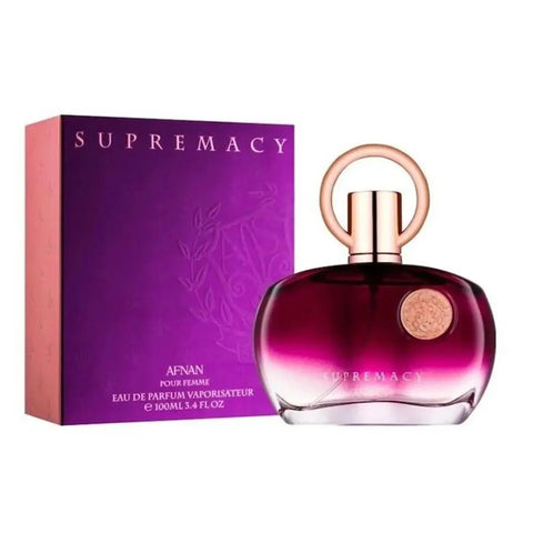 A 100ml Afnan Supremacy Eau De Parfum Pour Femme bottle by Jag Couture London New York, elegant glass perfume bottle with floral design.