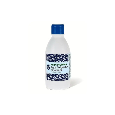 Bottle of Kern Pharma 4.9% hydrogen peroxide Agua Oxigenada in 250ml container, with Jag Couture London New York branding.