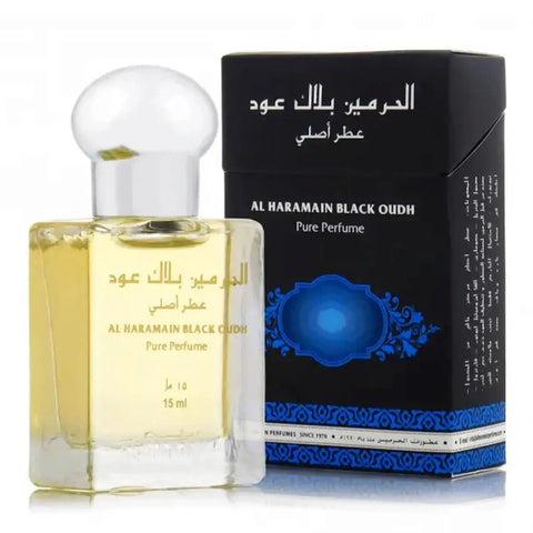 Al Haramain Black Oudh perfume Puro 15ml bottle, featuring dark amber liquid and elegant packaging from Jag Couture London.