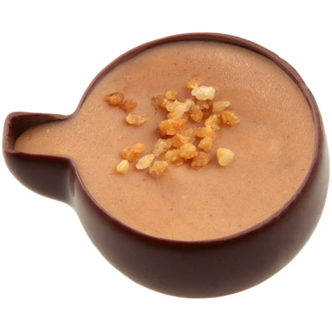 Anny milk chocolate caramel and gianduja confection by Jag Couture London, 14.4g, showing the chocolate piece with smooth filling.