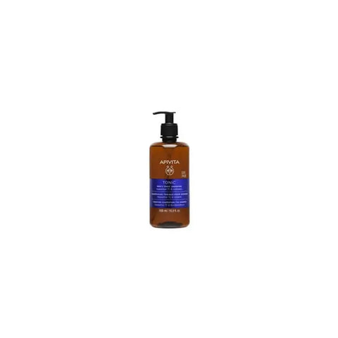 Apivita men's tonic shampoo 500ml in a clear bottle with a dark cap, displayed on a bathroom shelf.