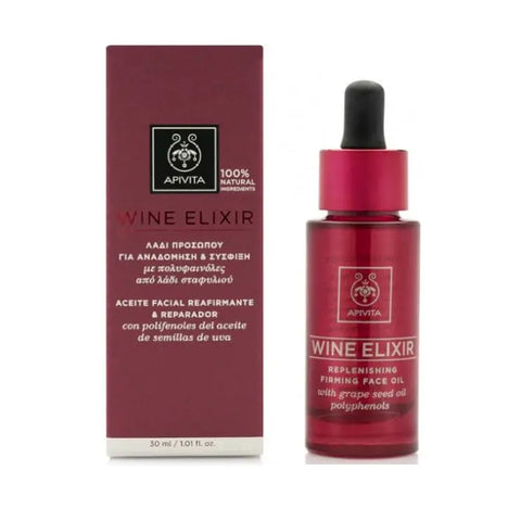 Apivita Wine Elixir replenishing firming face oil 30ml, with a sleek bottle and elegant packaging from Jag Couture London New York.