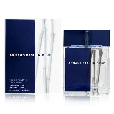 Armand Basi In Blue Eau De Toilette spray 100ml bottle, featuring sleek blue packaging with silver accents and a minimalist design.