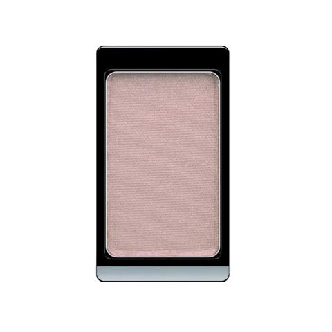Artdeco Pearl Eyeshadow in 99 Pearly Antique Rose, showcasing a soft pink shade with a shimmering finish, in a compact case.