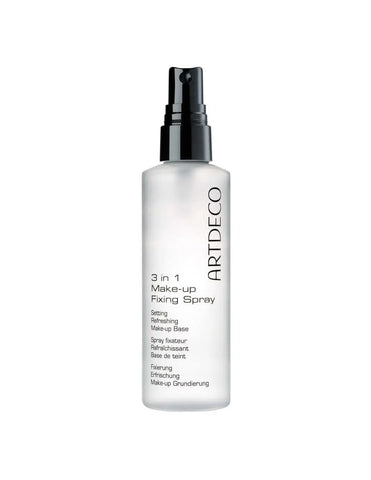 Artdeco 3-in-1 Makeup Fixing Spray by Jag Couture London New York, with a sleek spray bottle and product label visible.