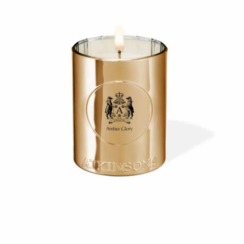 Amber Glory scented candle by Atkinsons, 200g, with a sleek glass holder and elegant label, ideal for ambient home decor.