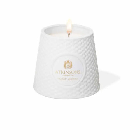 Atkinsons Mayfair Opulence scented candle in a 200g glass jar, featuring luxurious floral and woody notes, by Jag Couture London New York.