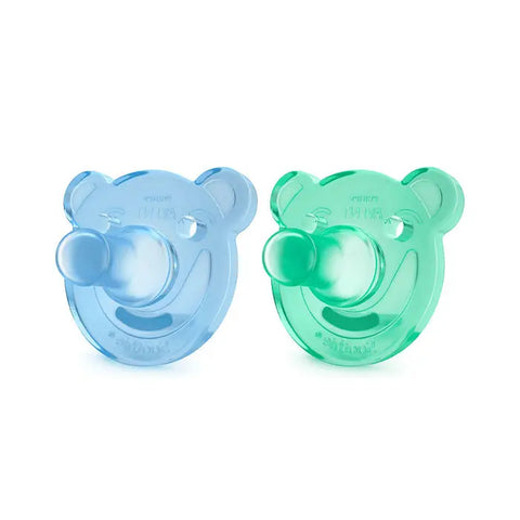 Two Avent silicone soothers for babies aged 0-3 months, designed for comfort and safety, by Jag Couture London New York.