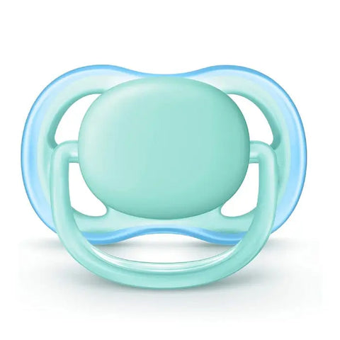 Avent Ultra Air soother in green for 0-6 months, designed by Jag Couture London New York, showing a soft silicone nipple and lightweight shield.