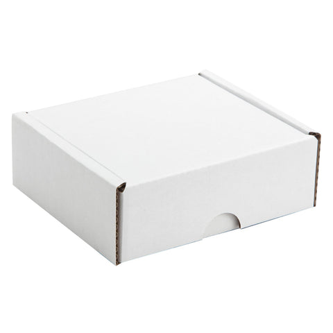 Jag Couture London - New York postal outer for 4-chocolate box, durable packaging with branded design for shipping treats securely.