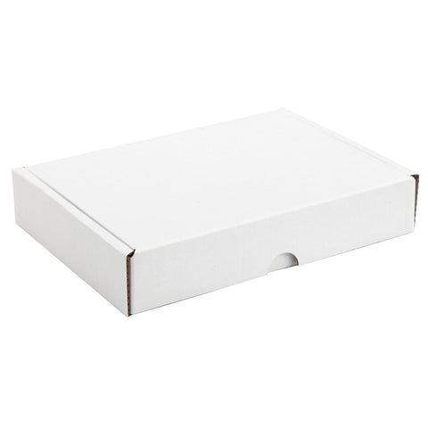 Jag Couture London – New York postal outer box designed to fit a 12-chocolate box, with a sleek and secure packaging design.