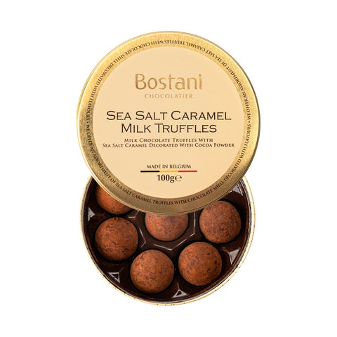 Gift tin of Jag Couture London sea salt caramel milk chocolate truffles rolled in cocoa powder, 11 x 3.6cm, in a decorative metal box.