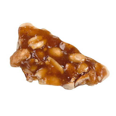 Golden peanut brittle by Jag Couture London - New York, close-up of crunchy, caramelized peanut brittle in a clear container.