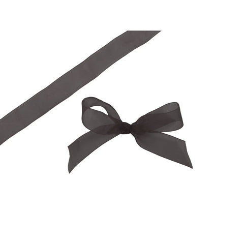 Black organza woven edge ribbon by Jag Couture London New York, showcasing delicate fabric with elegant woven edging.