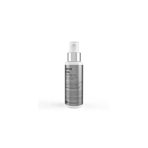 Botanicapharma Mox Oil Dry Touch 100ml from Jag Couture London New York, close-up of the sleek, amber-colored bottle with label