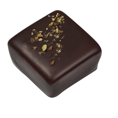Dark chocolate lemon ganache by Jag Couture London, 12g, showcased in elegant packaging with rich chocolate and vibrant lemon accents.