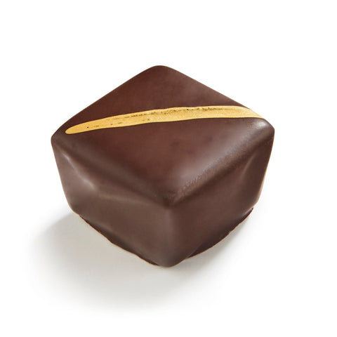 Glamour spiced ganache in dark chocolate by Jag Couture London New York, 13.5g, showcasing a rich, textured chocolate treat.
