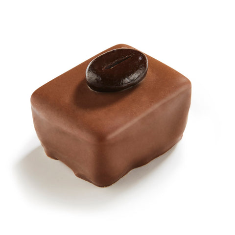 Kairo milk chocolate coffee praline by Jag Couture London New York, 20g, showing the chocolate-coated praline with coffee filling.