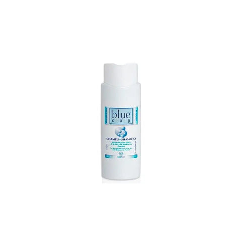 Blue cap anti-dandruff shampoo bottle from Jag Couture London and New York, 400ml size, with label and product branding visible.
