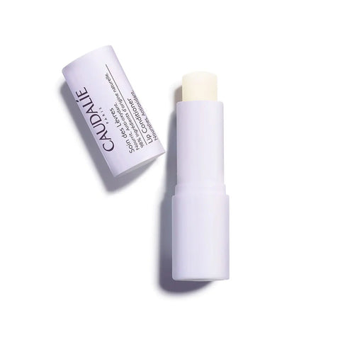 Caudalie Lip Conditioner 4g in a sleek tube, designed to nourish and hydrate lips with natural ingredients.