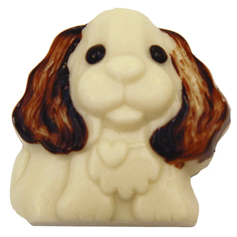 Decorated solid white chocolate Charles the spaniel figurine, crafted with detailed features, 46-piece set by Jag Couture London New York.
