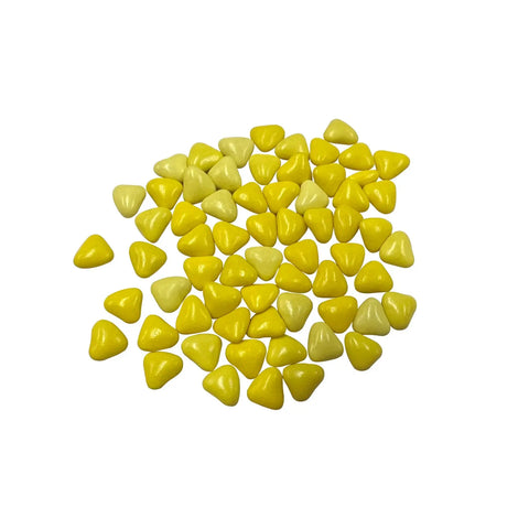 Milk chocolate hearts covered in yellow sugar from Choco Love Gialli by Jag Couture London New York, shown in a close-up image.