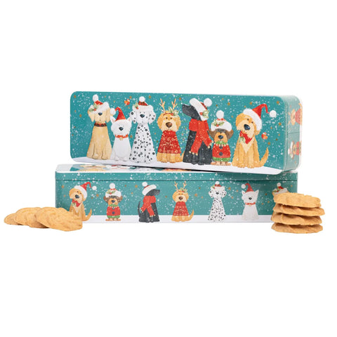 Rectangular tin of Christmas Dogs lemon and orange whirls cookies by Jag Couture London New York, decorated with holiday motifs.