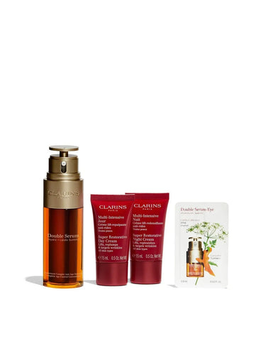 Clarins double-sided 50ml daytime and nighttime fragrance by Jag Couture London-New York, with sleek bottle and elegant design.