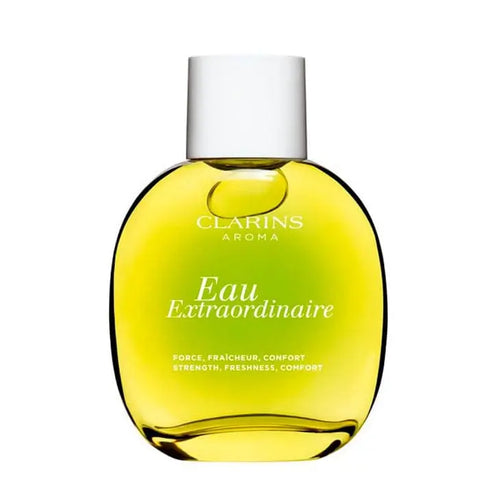 Clarins Eau Extraordinaire spray in a 100ml bottle, displayed with elegant packaging from Jag Couture London New York.