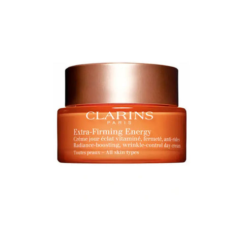 Clarins Extra-Firming Energy 50ml skincare jar with silver lid, featuring vibrant packaging and branding from Jag Couture London New York.