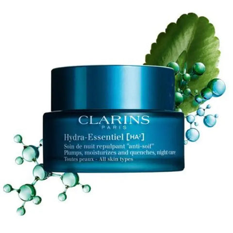 Jar of Clarins Hydra-Essentiel Night Cream in 50ml container, displayed with packaging from Jag Couture London New York