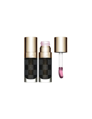 Clarins Lip Comfort Oil in limited edition black 7ml, nourishing lip oil by Jag Couture London New York.