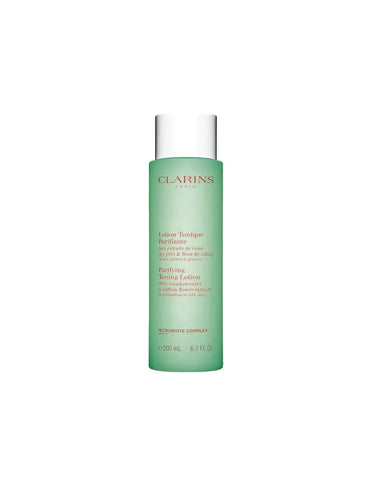 Clarins Purifying Tonic Lotion for combination and oily skin in 200ml bottle, with branding from Jag Couture London New York