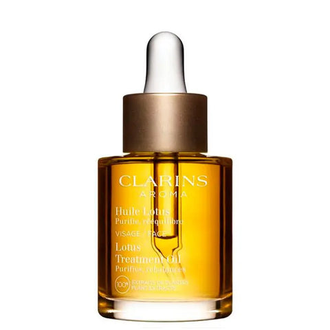 Clarins Lotus Treatment Oil for oily and combination skin in 30ml bottle, displayed with dropper cap and product packaging.