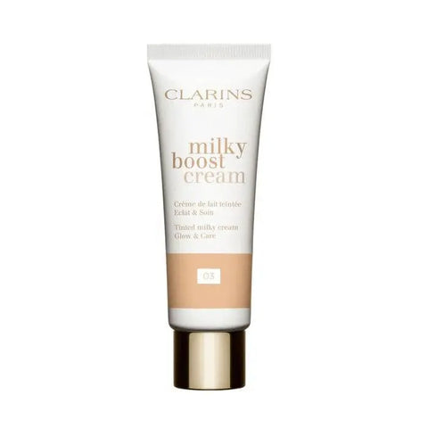 Clarins Milky Boost Cream 03 in 45ml jar, displayed with packaging, by Jag Couture London New York, showcasing skincare product.