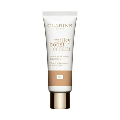 Clarins Milky Boost Cream 06 in a 45ml jar, featuring a sleek design from Jag Couture London New York.
