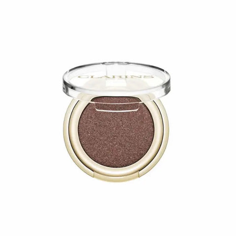 Clarins Ombre Skin 07 Satin Mocha eyeshadow in a sleek compact, showcasing rich mocha shades for a natural, polished look.