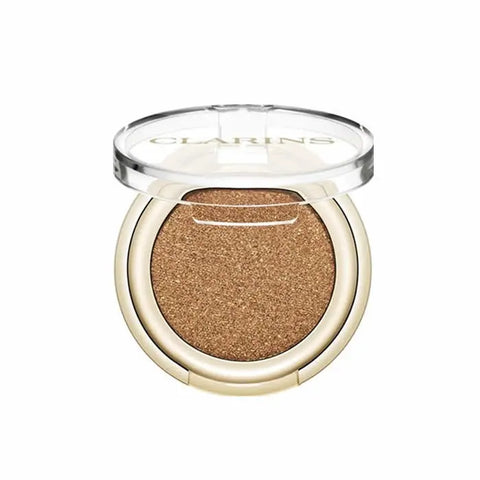 Clarins Ombre Skin 08 Pearly Raisin eyeshadow palette with shimmering shades, featuring a sleek compact from Jag Couture London New York