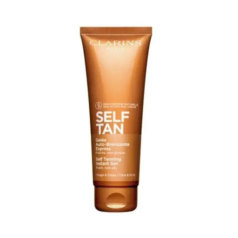 Clarins Self Tanning Instant Gel in 125ml, with a sleek tube design, showcasing the product by Jag Couture London New York.