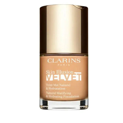 Clarins Skin Illusion Velvet foundation in shade 108W, 30ml bottle, with elegant packaging from Jag Couture London New York.