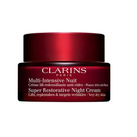 Clarins Super Restorative Night Cream for very dry skin in a 50ml jar, displayed with a luxurious skincare setting.